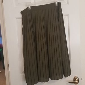 Green pleated skirt